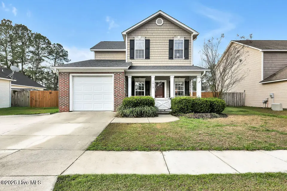 1013 Lake Norman Lane, Leland, NC 28451 — 4-bedroom home in Lake Forest Village, Leland, NC, photo 1 of 23: 1013LakeNormanLane-01