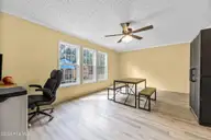 705 Maynard Boulevard, Jacksonville, NC 28546 — 3-bedroom manufactured home in Maynard Manor, Jacksonville, NC, photo 21 of 36: Family Room