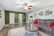 101 Shilou Drive, Pikeville, NC 27863 — 3-bedroom home in Sparrow Point, Pikeville, NC, photo 8 of 34: 101 Shilou Dr-Living Room 3