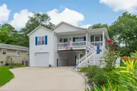 1803 W Yacht Drive, Oak Island, NC 28465 — 3-bedroom home in Pinners Point, Oak Island, NC, photo 1 of 39: 1803 W Yacht Dr