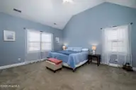 105 Fernie Lane, New Bern, NC 28560 — 3-bedroom home in The Lakes at Antioch, New Bern, NC, photo 21 of 48: Primary Bedroom with Vaulted Ceiling