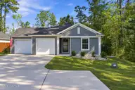 5256 Soybean Drive NE, Winnabow, NC 28479 — 3-bedroom home in Country Walk, Winnabow, NC, photo 3 of 43: Clean Suburban Ranch Exterior