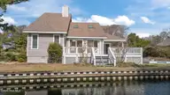 241 Windjammer W, Emerald Isle, NC 28594 — 3-bedroom waterfront home in Lands End, Emerald Isle, NC, photo 1 of 66: 2-web-or-mls-DJI_20260311114056_0659_D