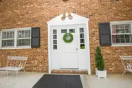 333 Driftwood Circle, Southern Pines, NC 28387 — 2-bedroom condo in Knollwood, Southern Pines, NC, photo 1 of 26: Bldg Front door