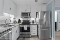 1404 Canal Drive Apt 11, Carolina Beach, NC 28428 — 2-bedroom condo in Ocean Harbor, Carolina Beach, NC, photo 9 of 48: 24-web-or-mls-DSC03887