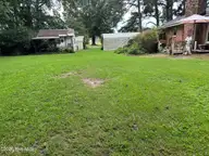 4646 Windsor Road, Elm City, NC 27822 — 3-bedroom home in Windsor Lake, Elm City, NC, photo 19 of 25: Additional backyard