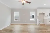 232 Cline Way 129, Beaufort, NC 28516 — 3-bedroom townhome in 1809 Live Oak, Beaufort, NC, photo 13 of 42: Open Concept Kitchen and Living
