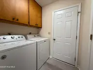 110 Holly Road, Pine Knoll Shores, NC 28512 — 3-bedroom home in Pine Knoll Association, Pine Knoll Shores, NC, photo 23 of 30: Laundry