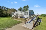 319 Honey Hill Drive, Hallsboro, NC 28442 — 3-bedroom manufactured home, Hallsboro, NC, photo 2 of 34: 03-IMG_6432