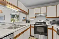 590 Marina Drive E-5, Pine Knoll Shores, NC 28512 — 3-bedroom waterfront condo in Beacon's Reach, Pine Knoll Shores, NC, photo 7 of 31: Kitchen