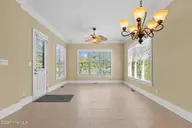 9274 Oldfield Road NW, Calabash, NC 28467 — 4-bedroom waterfront home in Crow Creek, Calabash, NC, photo 10 of 77: Breakfast & Sitting Room