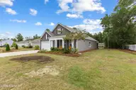 2260 Grande Palms Trail SE, Bolivia, NC 28422 — 4-bedroom home in Grande Palms, Bolivia, NC, photo 3 of 48: Right Side Yard