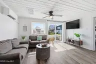 100 E Bogue Sound Drive, Atlantic Beach, NC 28512 — 4-bedroom waterfront home, Atlantic Beach, NC, photo 5 of 52: living room