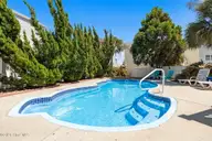 14 Private Drive, Ocean Isle Beach, NC 28469 — 5-bedroom home in Summer Place, Ocean Isle Beach, NC, photo 16 of 64: Refreshing Pool