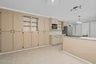 2239 Creekridge Drive, Rocky Mount, NC 27804 — 3-bedroom home in Creekridge, Rocky Mount, NC, photo 15 of 37: Wall of Cabinets/Kitchen
