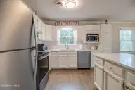 108 Hoffman Beach Road, Salter Path, NC 28512 — 3-bedroom waterfront home, Salter Path, NC, photo 18 of 42: kitchen with sink