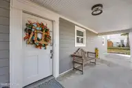 5419 W Beach Drive, Oak Island, NC 28465 — 7-bedroom waterfront home, Oak Island, NC, photo 19 of 69: 19_front entryway