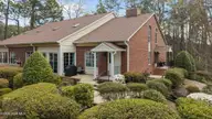 9265 Us 15-501 Highway 17d, Pinehurst, NC 28374 — 2-bedroom condo in Pinehurst Manor, Pinehurst, NC, photo 1 of 51: 1-web-or-mls-DJI_20260324123628_0687_D