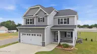 970 Nor-Am Road, Pikeville, NC 27863 — 4-bedroom home in Goose Creek, Pikeville, NC, photo 3 of 53: 3-web-or-mls-dji_20260427104043_0441_d