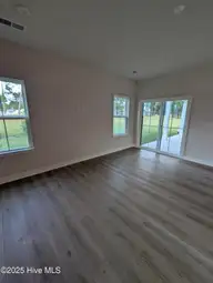 1276 Piper Glen Drive, Sunset Beach, NC 28468 — 3-bedroom home in Sea Trail Plantation, Sunset Beach, NC, photo 4 of 17: Living Area