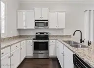 4938 Exton Park Loop, Castle Hayne, NC 28429 — 2-bedroom townhome in Exton Park Townhomes, Castle Hayne, NC, photo 4 of 42: CF59D8A5-EE53-4B76-9DAF-1A6C15171453