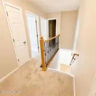 3917 Sterling Pointe Drive Kk4, Winterville, NC 28590 — 3-bedroom townhome in Sterling Pointe, Winterville, NC, photo 11 of 19: upstiars landing