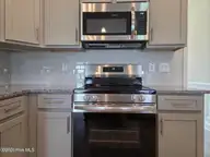 188 Eliza Way, Winterville, NC 28590 — 4-bedroom home in Copper Creek, Winterville, NC, photo 19 of 45: 2100 Kitchen