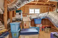 239 Seneca Reef Drive, Hampstead, NC 28443 — 3-bedroom home in Seneca Reef, Hampstead, NC, photo 24 of 39: Attic
