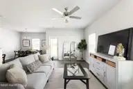 107 Maymont Street NW, Supply, NC 28462 — 4-bedroom home in Richmond Hills, Supply, NC, photo 8 of 12: Escape Model Living Room 3