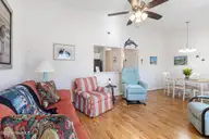 2900 Myrtle Street 11 Rosewood Village, Morehead City, NC 28557 — 2-bedroom townhome in Rosewood Village, Morehead City, NC, photo 8 of 27: Open Living Room & Dining Area