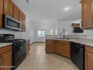 200 E Howard Drive, Jacksonville, NC 28540 — 4-bedroom home in River Bluff, Jacksonville, NC, photo 14 of 55: Kitchen 1