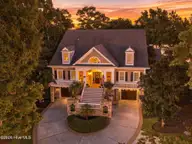 2144 Arnold Palmer Drive, Shallotte, NC 28470 — 6-bedroom home in Rivers Edge, Shallotte, NC, photo 1 of 50: Front Home View