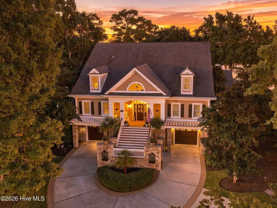 2144 Arnold Palmer Drive, Shallotte, NC 28470 — 6-bedroom home in Rivers Edge, Shallotte, NC, photo 1 of 50: Front Home View