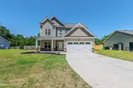 673 Morris Landing Road, Holly Ridge, NC 28445 — 3-bedroom home in The Preserve At Morris Landing, Holly Ridge, NC, photo 3 of 76: Front