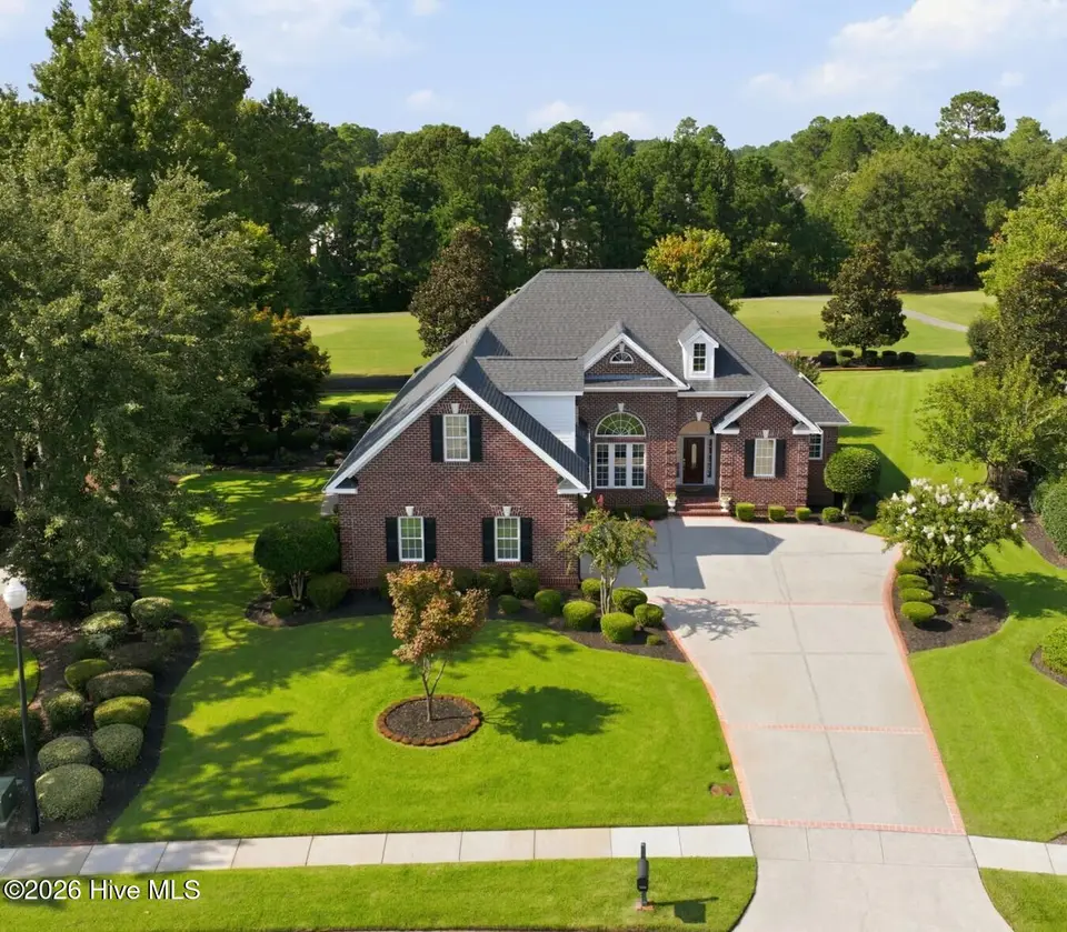 1009 West Cove Loop, Leland, NC 28451 — 4-bedroom home in Magnolia Greens, Leland, NC, photo 1 of 33
