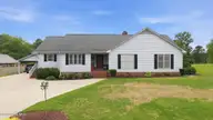 7790 S Old Carriage Road, Rocky Mount, NC 27803 — 3-bedroom home, Rocky Mount, NC, photo 1 of 51: 1-web-or-mls-DJI_20260511094842_0302_D