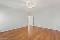202 Winterlochen Drive, Jacksonville, NC 28540 — 3-bedroom home in Williamsburg Plantation, Jacksonville, NC, photo 17 of 37: Master Bedroom