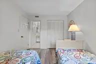590 Marina Drive E-5, Pine Knoll Shores, NC 28512 — 3-bedroom waterfront condo in Beacon's Reach, Pine Knoll Shores, NC, photo 16 of 31: Bedroom 2