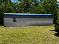 408 57 Tarpon Pointe Road, Bath, NC 27808 — waterfront lot in Carolina Shores, Bath, NC, photo 15 of 23: 408 Tarpon building side