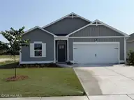 759 Pelican Cove Way SE 215, Southport, NC 28461 — 3-bedroom home in Pelican Cove, Southport, NC, photo 1 of 20: Waterlily
