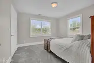 134 Wild Berry Lane, Hampstead, NC 28443 — 5-bedroom waterfront home in Bent Tree, Hampstead, NC, photo 22 of 46: Bedroom