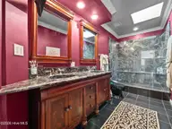 1505 Salter Path Road M, Indian Beach, NC 28512 — 4-bedroom waterfront condo in Summer Winds Condominiums, Indian Beach, NC, photo 21 of 68: Master Bath