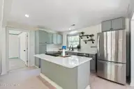 13290 New Britton Highway E, Nakina, NC 28455 — 3-bedroom home, Nakina, NC, photo 22 of 74: Island w/ Breakfast Bar