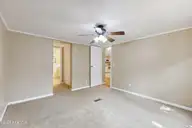 630 Dogwood Drive, Sunset Beach, NC 28468 — 3-bedroom manufactured home in Seaside Station, Sunset Beach, NC, photo 16 of 36: Primary Bedroom