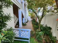 312 Causeway Drive Unit A, Wrightsville Beach, NC 28480 — 3-bedroom waterfront condo, Wrightsville Beach, NC, photo 16 of 65: walkway to stairs