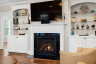 2585 Parkridge Drive, Southport, NC 28461 — 4-bedroom waterfront home in St James, Southport, NC, photo 16 of 77: Gas Fireplace | Remote Operated