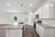 105 Hallwood Drive, Pikeville, NC 27863 — 3-bedroom home in Franklin Landing, Pikeville, NC, photo 5 of 9: KITCHEN 105