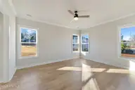 115 S Middleton Drive NW, Calabash, NC 28467 — 4-bedroom waterfront home in Brunswick Plantation, Calabash, NC, photo 15 of 38: Primary Suite