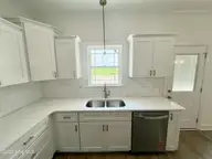 310 E Norwayne Alumni Way, Fremont, NC 27830 — 3-bedroom home in The Cottages on Vance, Fremont, NC, photo 7 of 20: IMG_2299