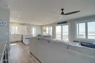 209 W Beach Drive, Oak Island, NC 28465 — 5-bedroom waterfront home in W. Long Beach, Oak Island, NC, photo 8 of 60: 209 W Beach Drive 12